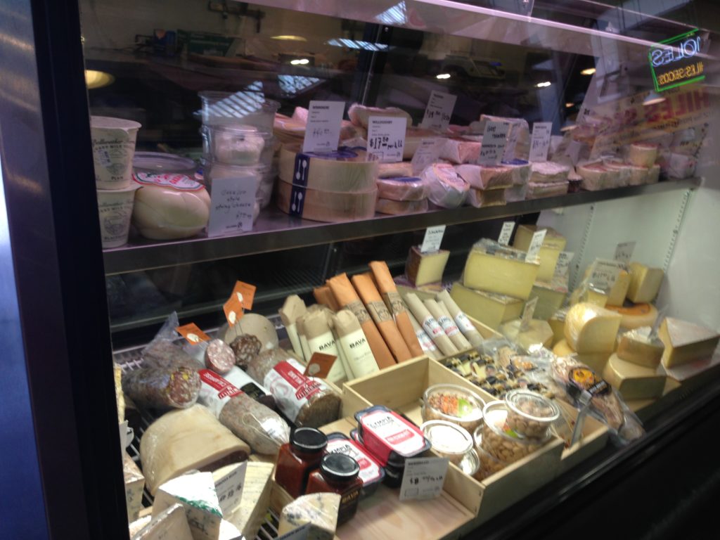 Cheese Vendor in Grand Central Market with assortment of specialty cheese