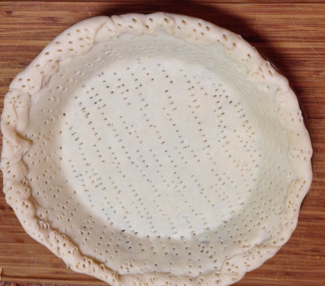 Pie Crust forked to death for Spicy Sausage and Egg Pie Recipe