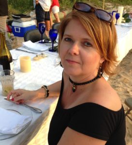 Mimi Woodham Dining on Beach with Friends