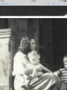 Grandmother Theda Faye holding one of her babes
