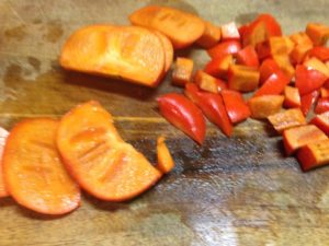 Beautiful persimmons  on cutting board 