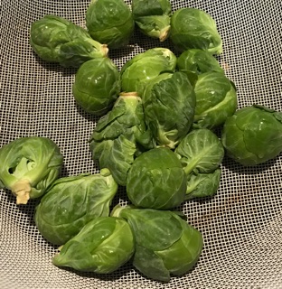 Fresh Brussel Sprouts in colander