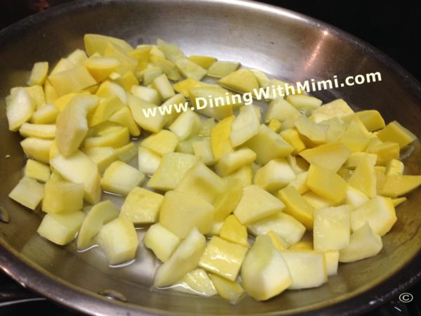 hopped Yellow Squash Cooking in saucepan www.diningwithmimi.com