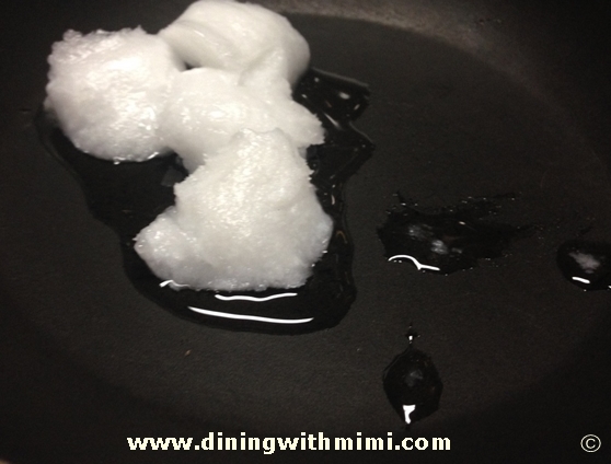 Melting coconut oil for Fig Chess Pie www.diningwithmimi.com