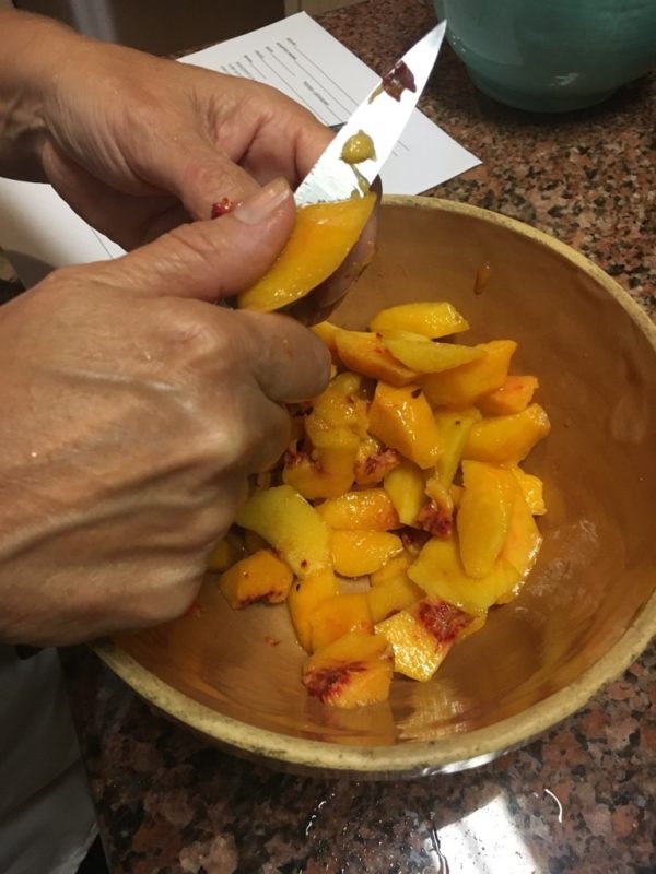 Peeling peaches Rustic Peach Tart www.diningwithmimi.com