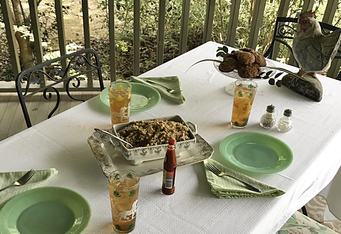 Table setting with Jadite Dishes, Cabbage Dressing, Sweet Tea and LA Hot Sauce www.diningwithmimi.com