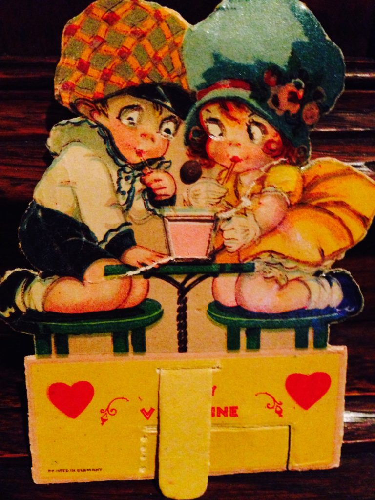 Vintage Valentine of boy and girl sharing a soda www.diningwithmimi.com