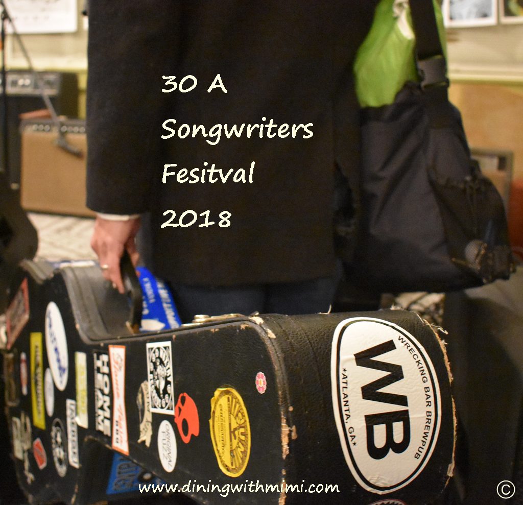 Guitar Man holding his instrument Songwriters Festival 2018 www.diningwithmimi.com