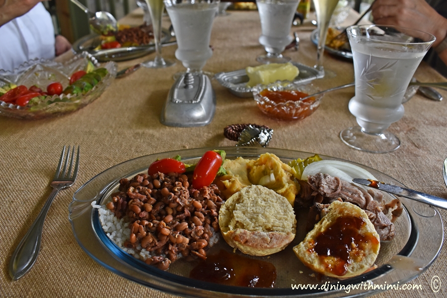 Table setting on porch Wine, Women, Pork Roast and Anson Mills www.diningwithmimi.com