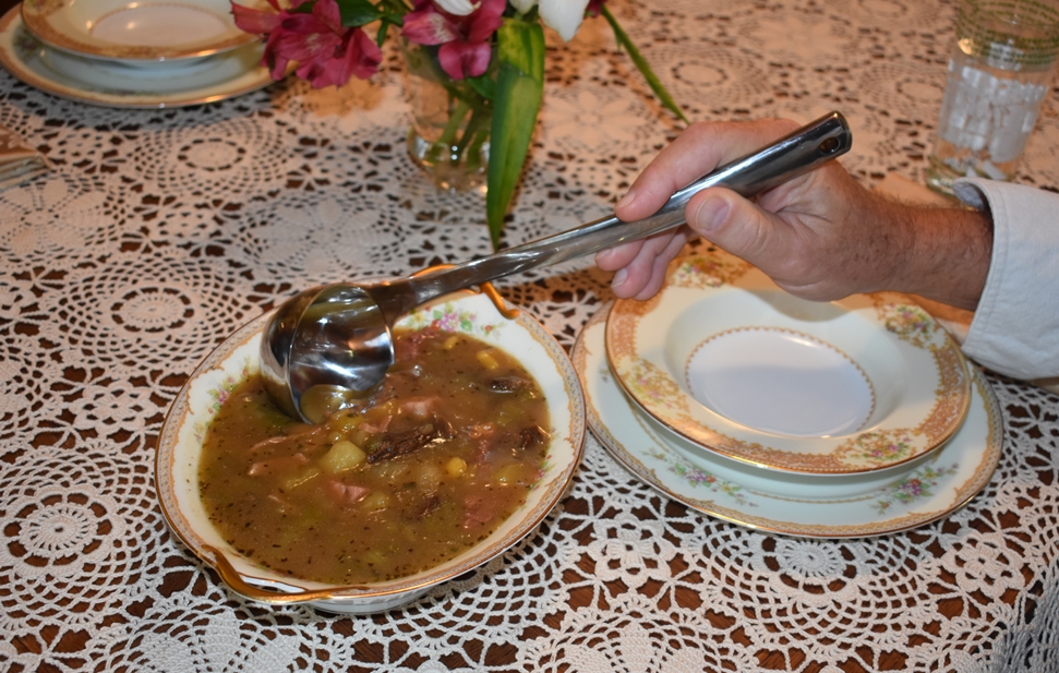 Vintage tablecloth and Noritake dishes containing Save a Ham Bone, Feed a Cowboy www.diningwithmimi.com