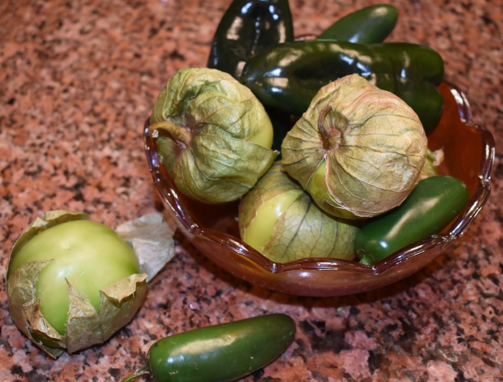 Bowl of Tomatillios, Poblanos and Jalapeno for Smoky Roasted Poblano, Tomatillio and Tomato Salsa www.diningwithmimi.com