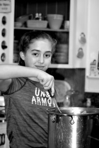 oung girl adding squash pickles to canning jarsBlack and white of Sous Chef in Training My Fearless Sous Chef in Training www.diningwithmimi.com My Fearless Sous Chef In Training www.diningwithmimi.com