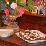 Serve dessert on platter for Nutty Fudgy Indulgent Pecan Bar www.diningwithmimi.com