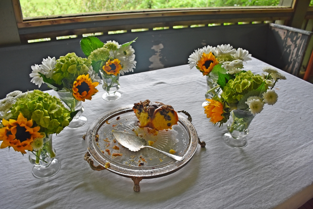 Cake Plate with slice of Mimi's Never Fail Spirited Blueberry Bundt Cake www.diningwithmimi.com