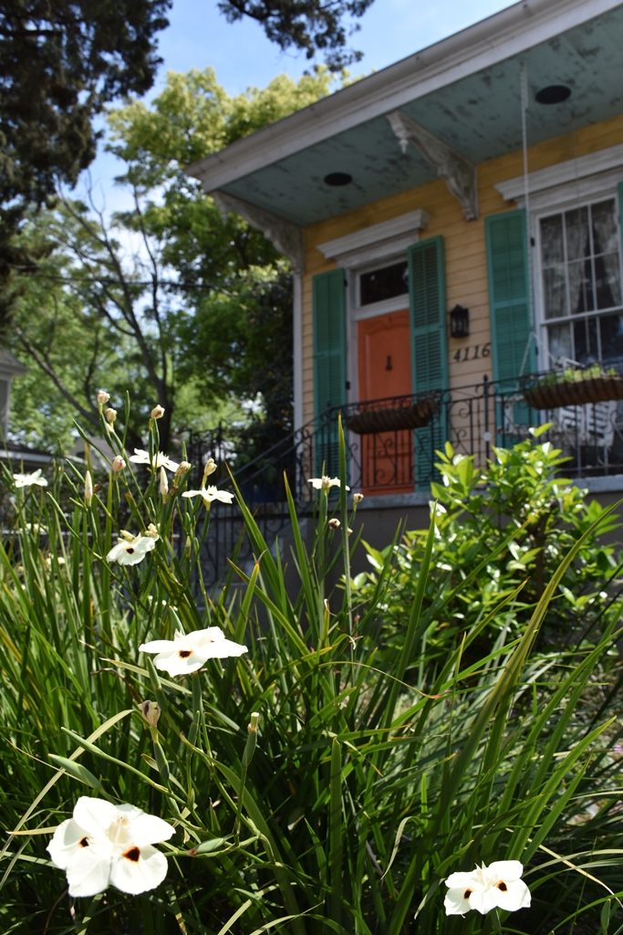 Quaint yellow shutgun house with green shutters and orange door Need a quickie- Drop into New Orleans for 48 hours www.diningwithmimi.com