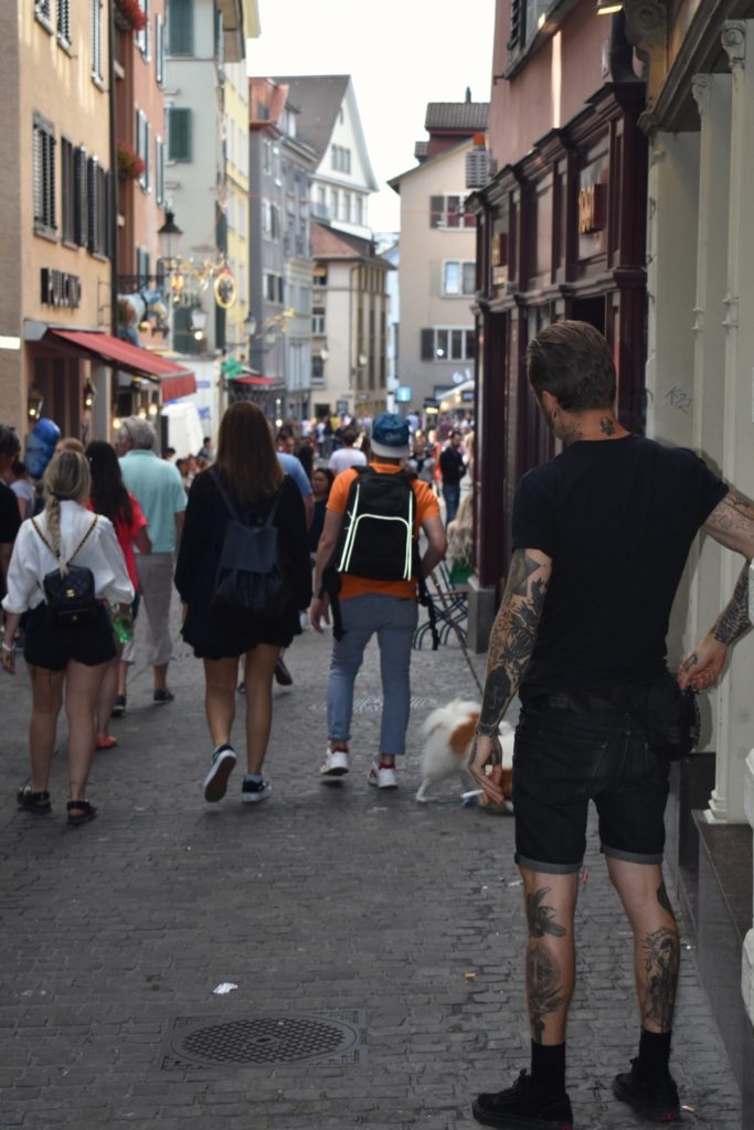 Busy Street Scene in Zurich for Missing The Swiss While Jet-lagged and Hoarding Chocolate www.diningwithmimi.com