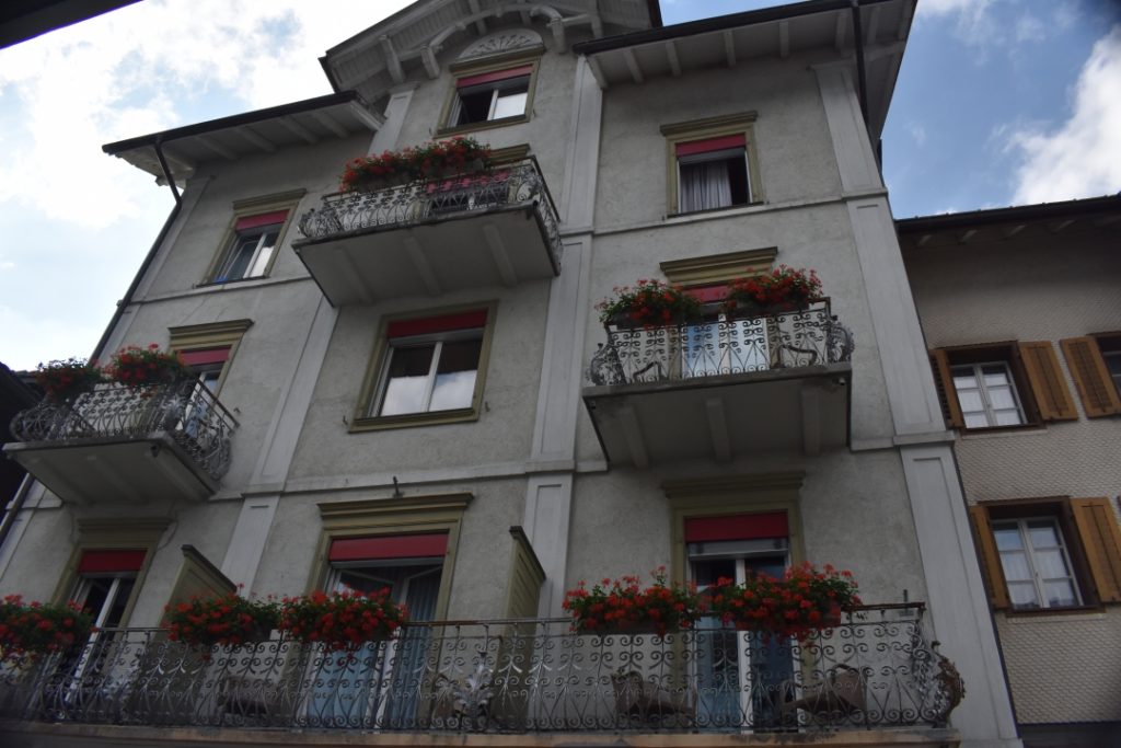 Flower boxes on balcony for Dazed by Engelberg in July www.diningwithmimi.com