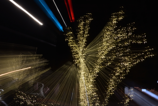 Red White and blue lights in a dark sky that resemble fireworks La Revue Dining WIth Mimi ,1 www.diningwithmimi.com